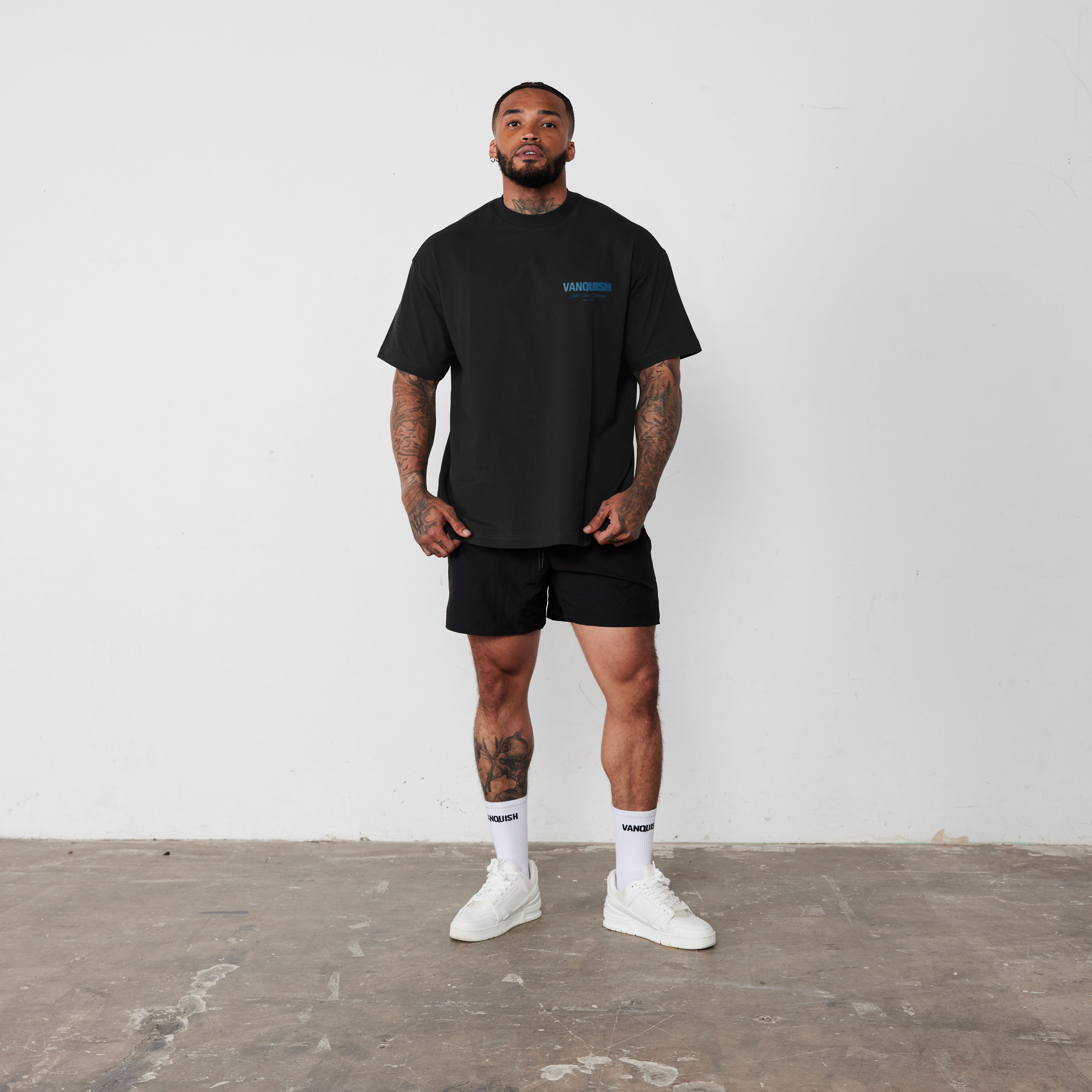 REVOLVE MOMENTUM BLACK AND BLUE BOXY T SHIRT