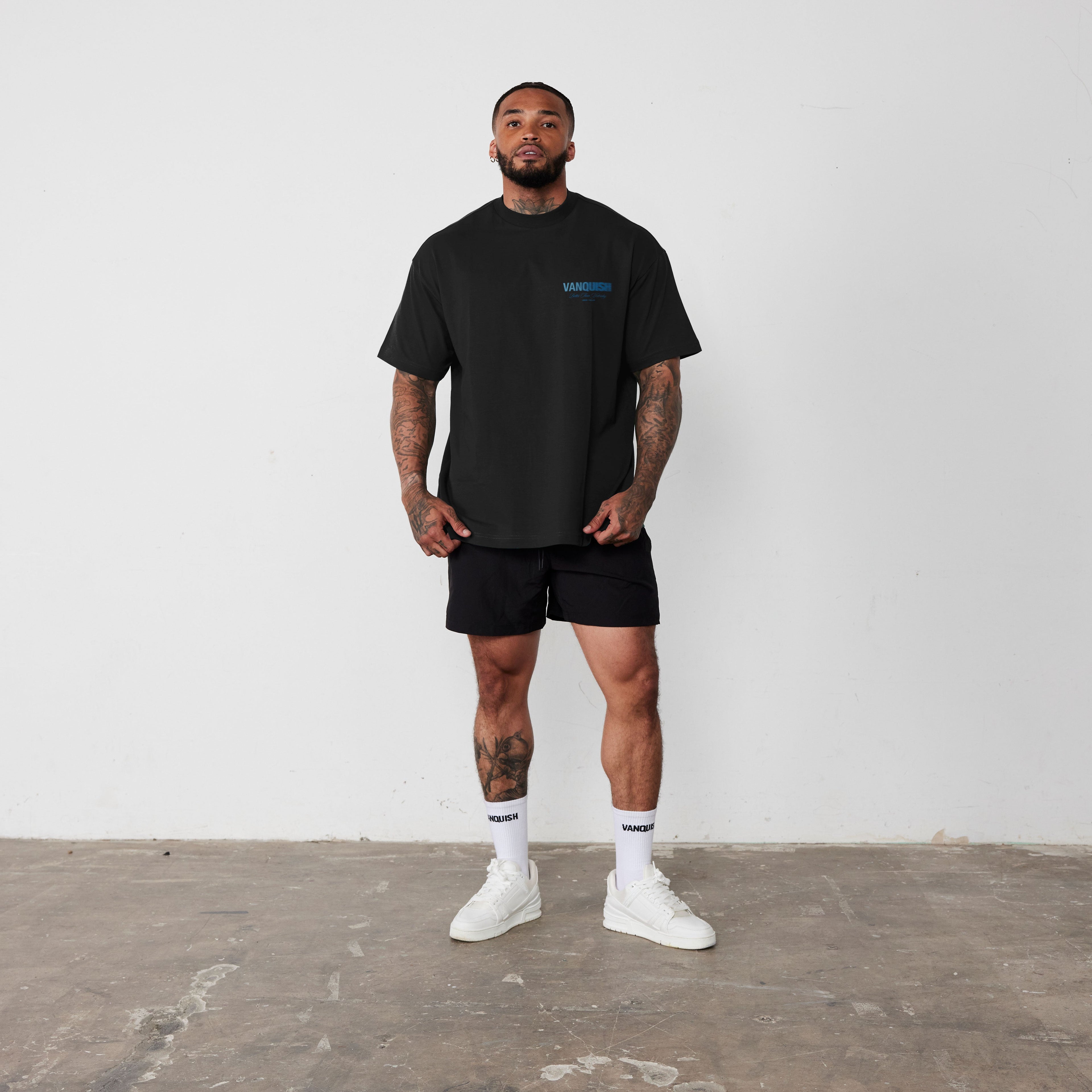 REVOLVE MOMENTUM BLACK AND BLUE BOXY T SHIRT